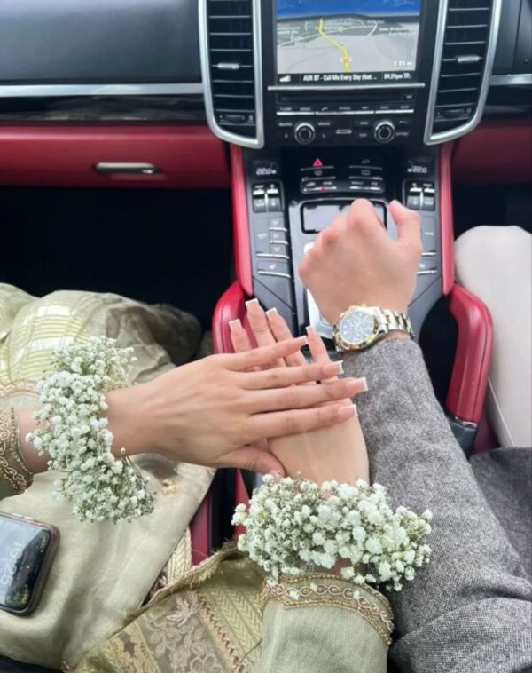 Baby Breath Floral Gajra lifestyle shot displaying fresh white gypsophila wrist bracelets from J's Store